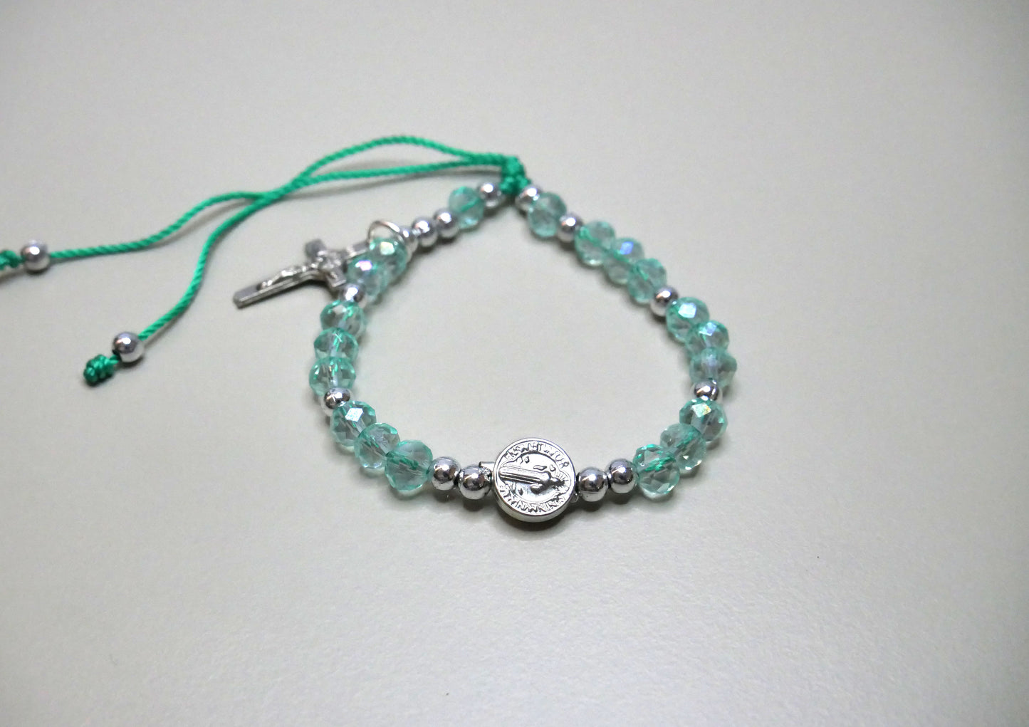 Handmade Silver Threaded Bracelet with St. Benedict Medal, Silver Beads, and Dangling Holy Cross for Protection