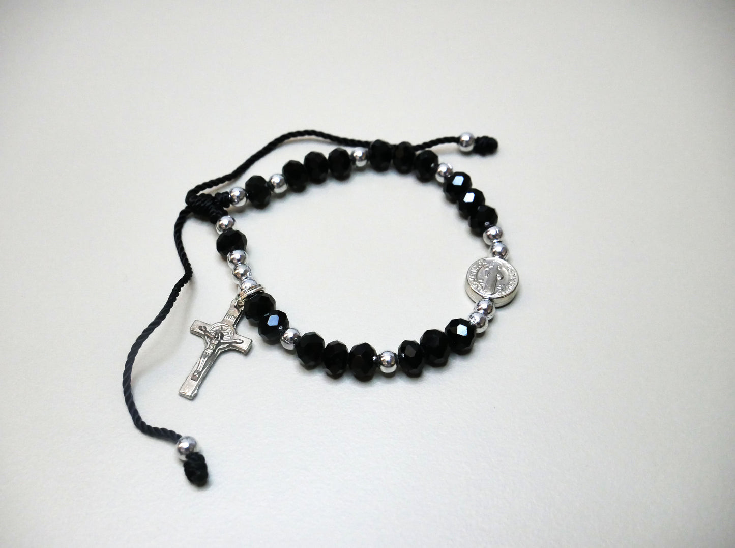 Handmade Silver Threaded Bracelet with St. Benedict Medal, Silver Beads, and Dangling Holy Cross for Protection