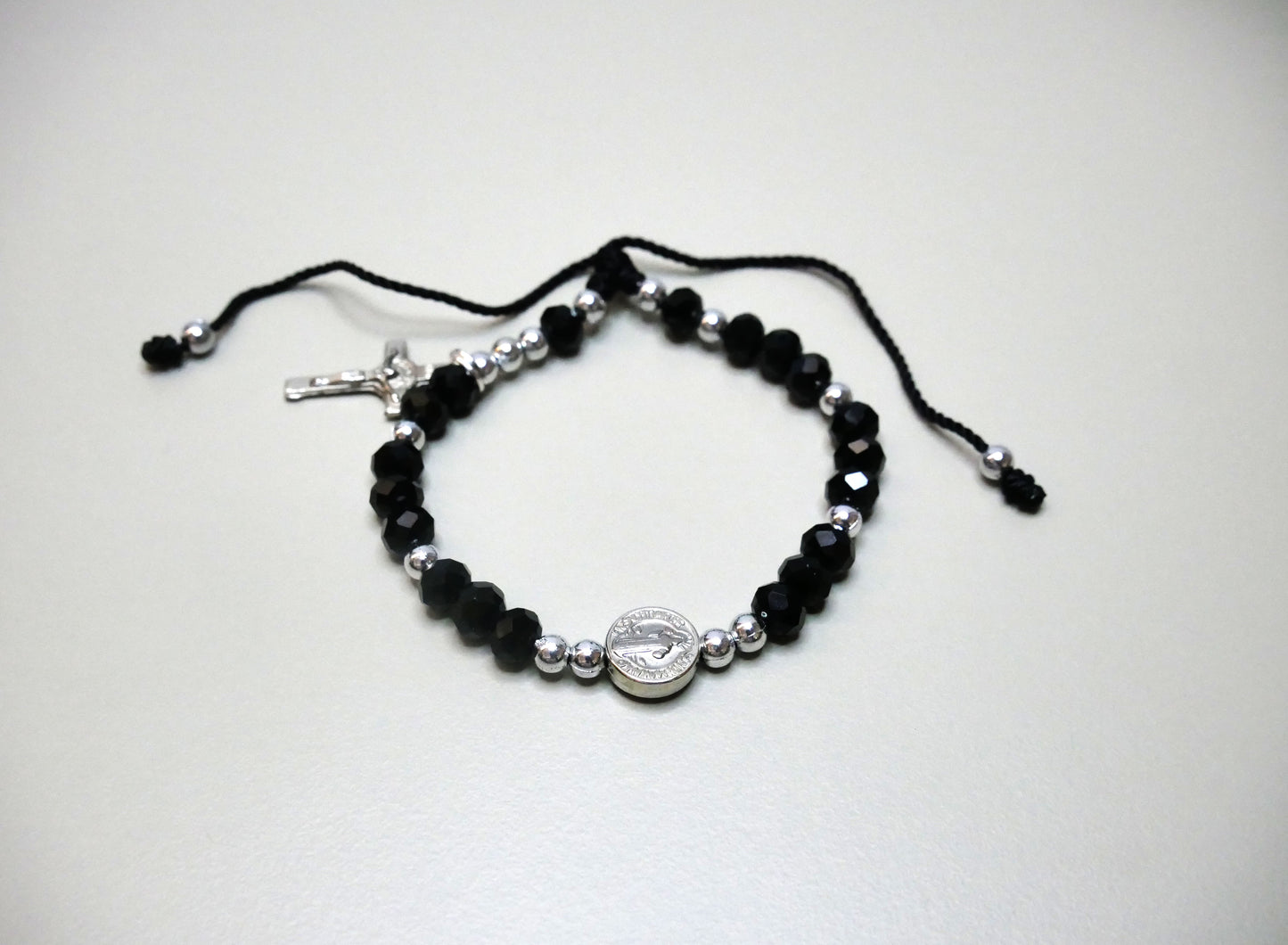 Handmade Silver Threaded Bracelet with St. Benedict Medal, Silver Beads, and Dangling Holy Cross for Protection