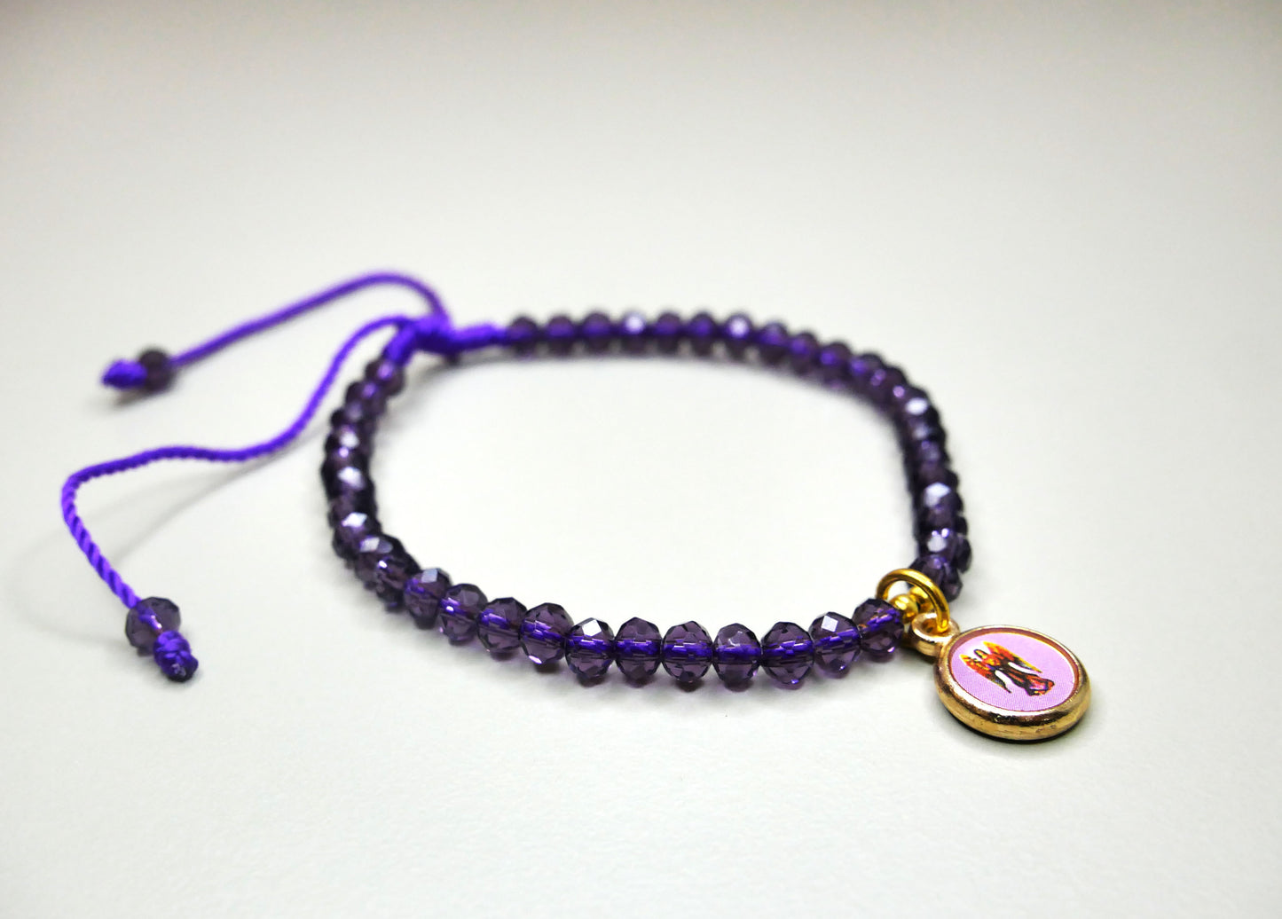 Handmade Purple Crystal Bracelet with Dangling Archangel Zadkiel Charm for Healing, Forgiveness, and Spiritual Growth