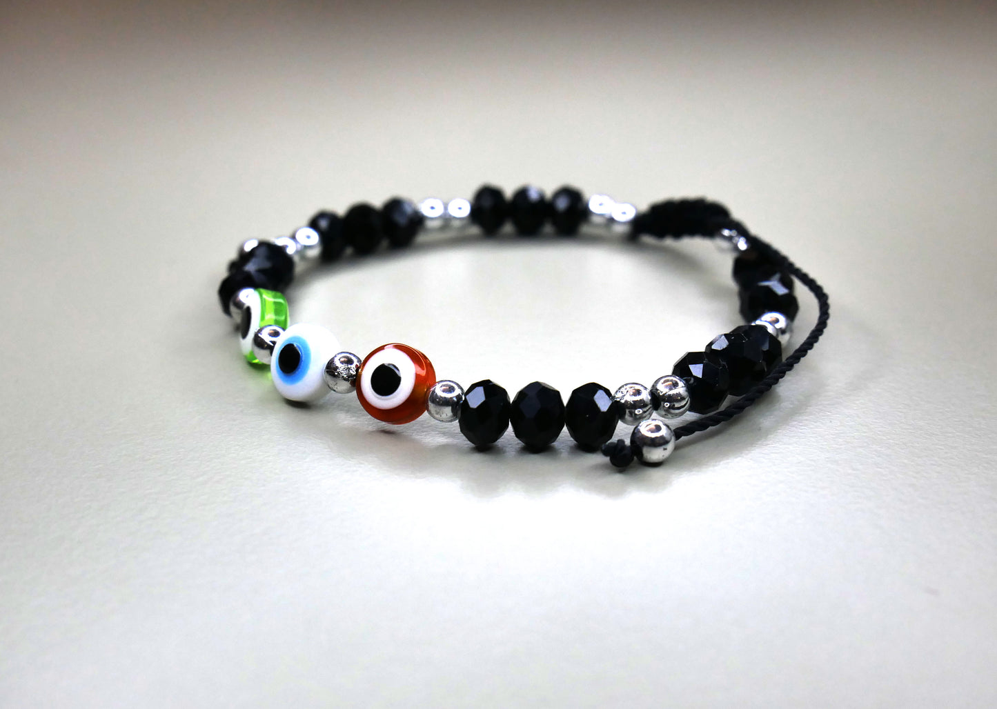 Elegant Handmade Black Crystal Bracelet with 3 Evil Eye Charms for Ultimate Protection, Style, and Positive Energy – A Perfect Accessory to Shield Against Negativity and Enhance Your Everyday Look