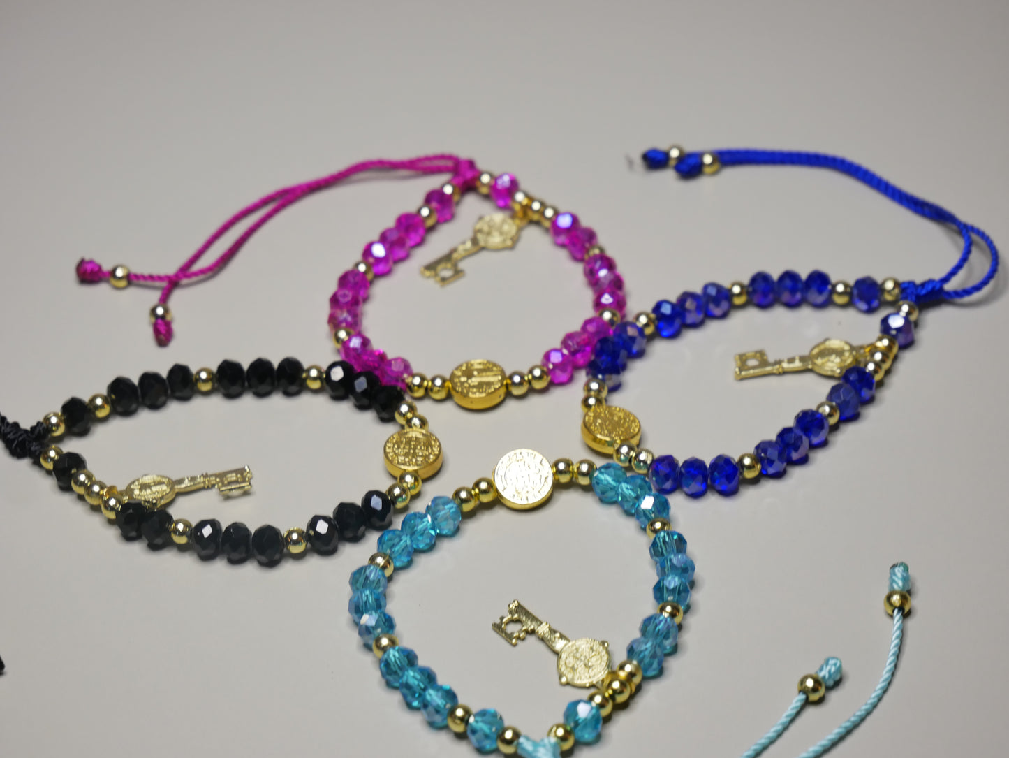 Handmade Multicolor Crystal Bracelets with Golden St. Benedict Medal and Golden Key Charm – Unlock Style, Faith, and Divine Protection